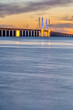 The iconic Oresund bridge between Denmark and Sweden after sunset
