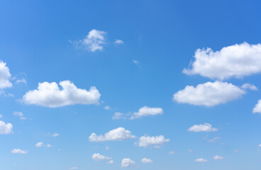 Wall Mural - clear blue sky background with white clouds