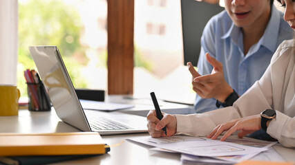 Wall Mural - cropped image of creative people planning, working together on mobile application software design pr