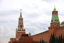Red Square In Moscow With Kremlin Towers And Lenin Mausoleum On Cloudy Sky Background. Symbol Of Russian Authorities