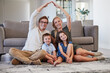 © Alexis Scholtz/peopleimages.com - Family home with parents, kids and roof sign for real estate, moving house property and life insurance policy, cover and support. Portrait of mom, dad and rooftop over children in lounge for security