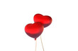 two shiny luminous red love heart shaped balloons on golden string abstract 3D illustration isolated
