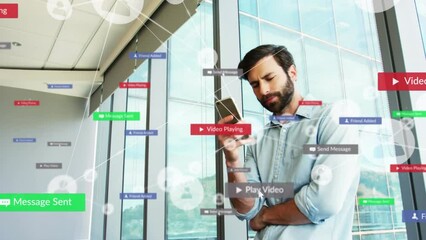 Sticker - Animation of network of connetcions with icons over caucasian man using smartphone