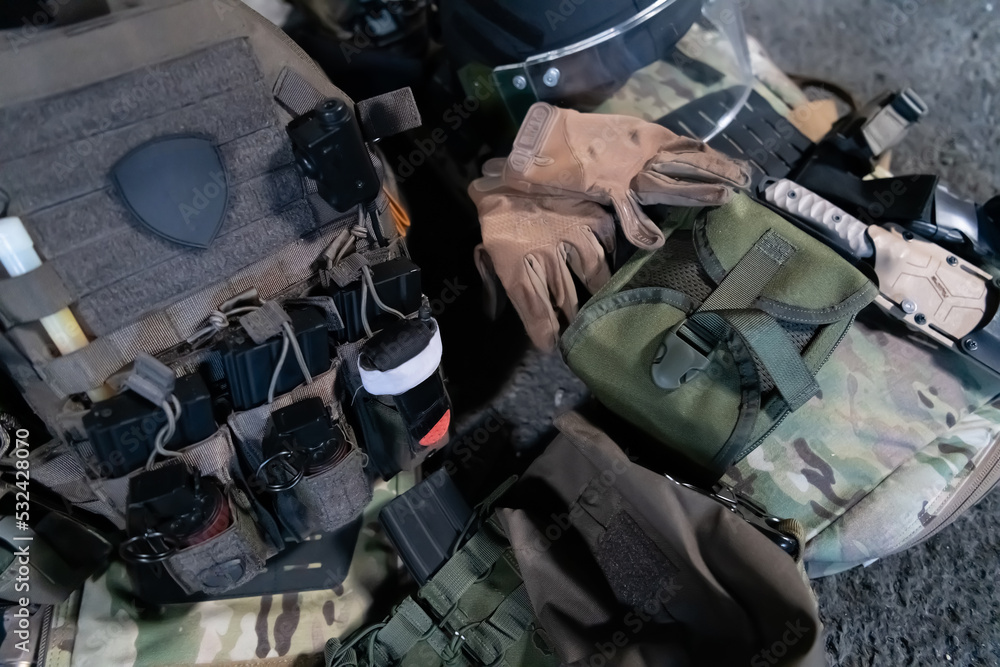 Army body armor, helmet and ammunition, Kalashnikov assault rifle with ...