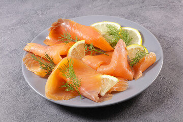 Poster - plate of smoked salmon fillet and lemon