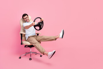 Sticker - Full length photo of carefree worker guy sit chair hold steering wheel imagine fast ride isolated pastel color background