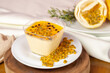 delicious passion fruit mousse in a rustic setting.