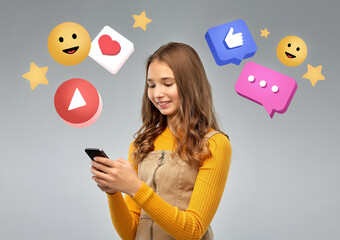 Sticker - technology, social media and people concept - smiling teenage girl using smartphone over internet icons on grey background