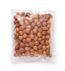 Wall Mural - Top view of shelled hazelnuts in transparent plastic bag