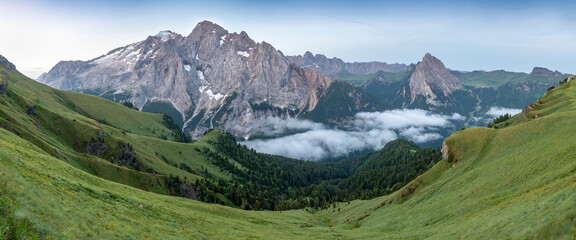 Wall Mural - Summer Panorama in Val Badia, Dolomites. In the background the Marmolada, located at the Dolomiti Range, Italy