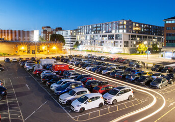 Wall Mural - Aerial view of Princes Street Car illuminated at dusk with long exposure