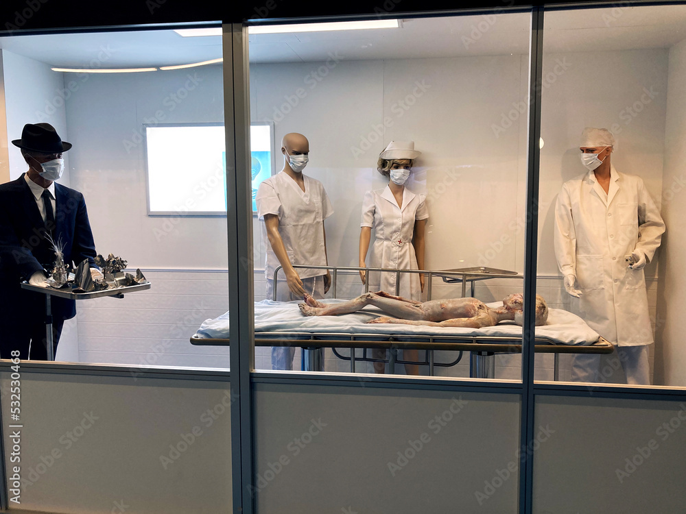 An alien autopsy from Area 51 in the medical room.