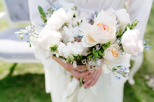 Incognito Bride With Wedding Bouquet 