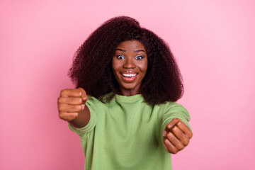 Canvas Print - Photo of cheerful satisfied person arms hold imagine wheel toothy smile isolated on pink color background