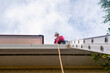 © ByLorena/Stocksy - Construction woman roof installer