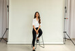 © Valentina Barreto/Stocksy - Asian  businesswoman studio shot