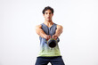 © ALTO IMAGES/Stocksy - Strong male athlete swinging kettlebell