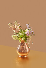 Old-fashioned Embossed Copper Jug With Blooms.