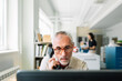 © Studio Firma/Stocksy - Middle-aged Man at Work