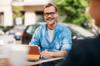 © Studio Firma/Stocksy - Men Sitting in Cafe