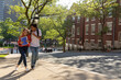 © Raymond Forbes LLC/Stocksy - Friend Pair together at  University college campus