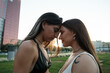 © Malquerida Studio/Stocksy - Young lesbian couple face to face