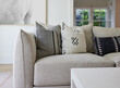 © Trinette Reed/Stocksy - Modern design sofa in interior farmhouse living room