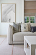 © Trinette Reed/Stocksy - Modern design sofa in interior farmhouse living room with artwork
