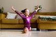 © Eloisa Ramos/Stocksy - little girl practicing artistic gymnastics at home