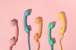 © Pixel Stories/Stocksy - Old pastel stationary phone phone handsets