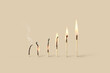 © Yaroslav Danylchenko/Stocksy - Matches set with varying level of burnout