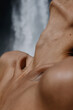 © Anastasia Mihaylova (Shpara)/Stocksy - Close up vertical photo of woman's neck skin texture with waterfall