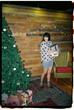 © BONNINSTUDIO/Stocksy - User-generated content brunette with Christmas presents
