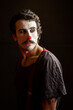 © Albert Martinez/Stocksy - Beautiful portrait of an unhappy joker