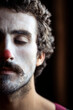 © Albert Martinez/Stocksy - Clown with closed eyes