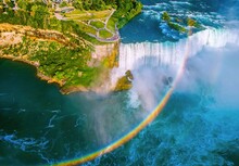 High Angle Aerial Drone View Of Niagara Falls With Glorious  Rainbow