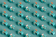 © Giada Canu/Stocksy - isometric pattern of many workstations with personal computer