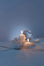 Crystals, Glass Ball And Candles On Marble Background