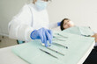 © Felipe Barrera/Stocksy - female dentist examining child teeth in dentist's office