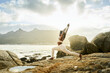 © Juno/Stocksy - yoga outdoors at sunset