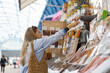 © Javier Pardina/Stocksy - Buying dried food