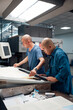© ZQZ Studio/Stocksy - Asian workers in printing industry