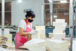 © ZQZ Studio/Stocksy - Woman in printing industry