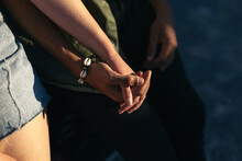 Close-up Of Couple Holding Hands