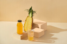 Fresh Pineapple Juice On Yellow Background