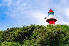 Little Red And White Striped Lighthouse