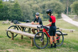 © Daniel Gonzalez/Stocksy - Men with gravel bikes in countryside
