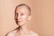 © Asya Molochkova/Stocksy - Moisturizing and delivering anti-aging benefits of dermatology cream