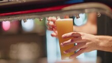 4K Bartender Pouring Frothy Tap Beer Into Schooner Glass At Bar, Slow Motion