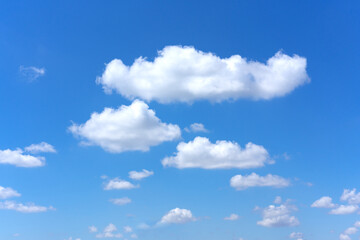 Wall Mural - clear blue sky background with white clouds